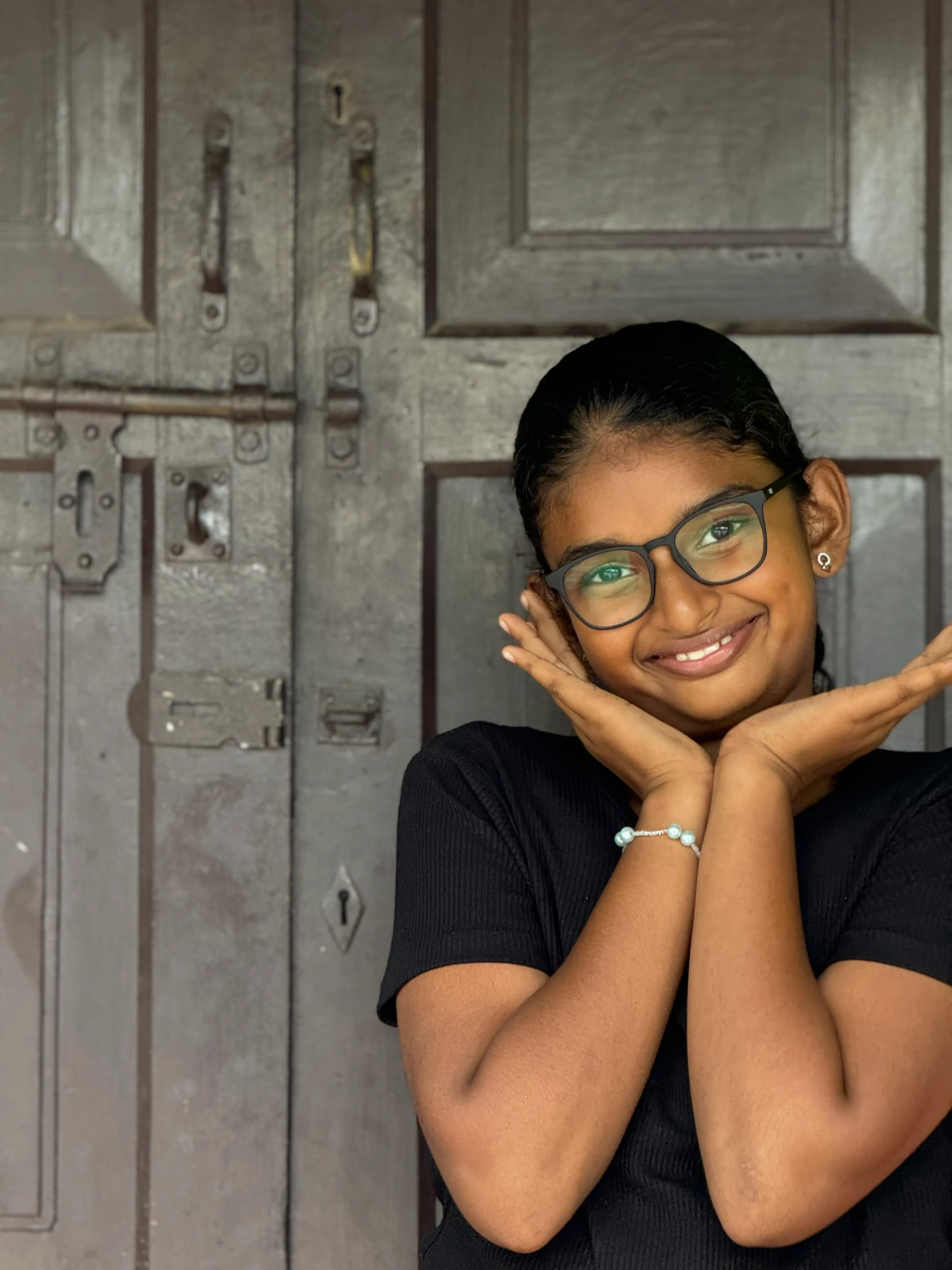 A young face, looking forward with quiet conviction.